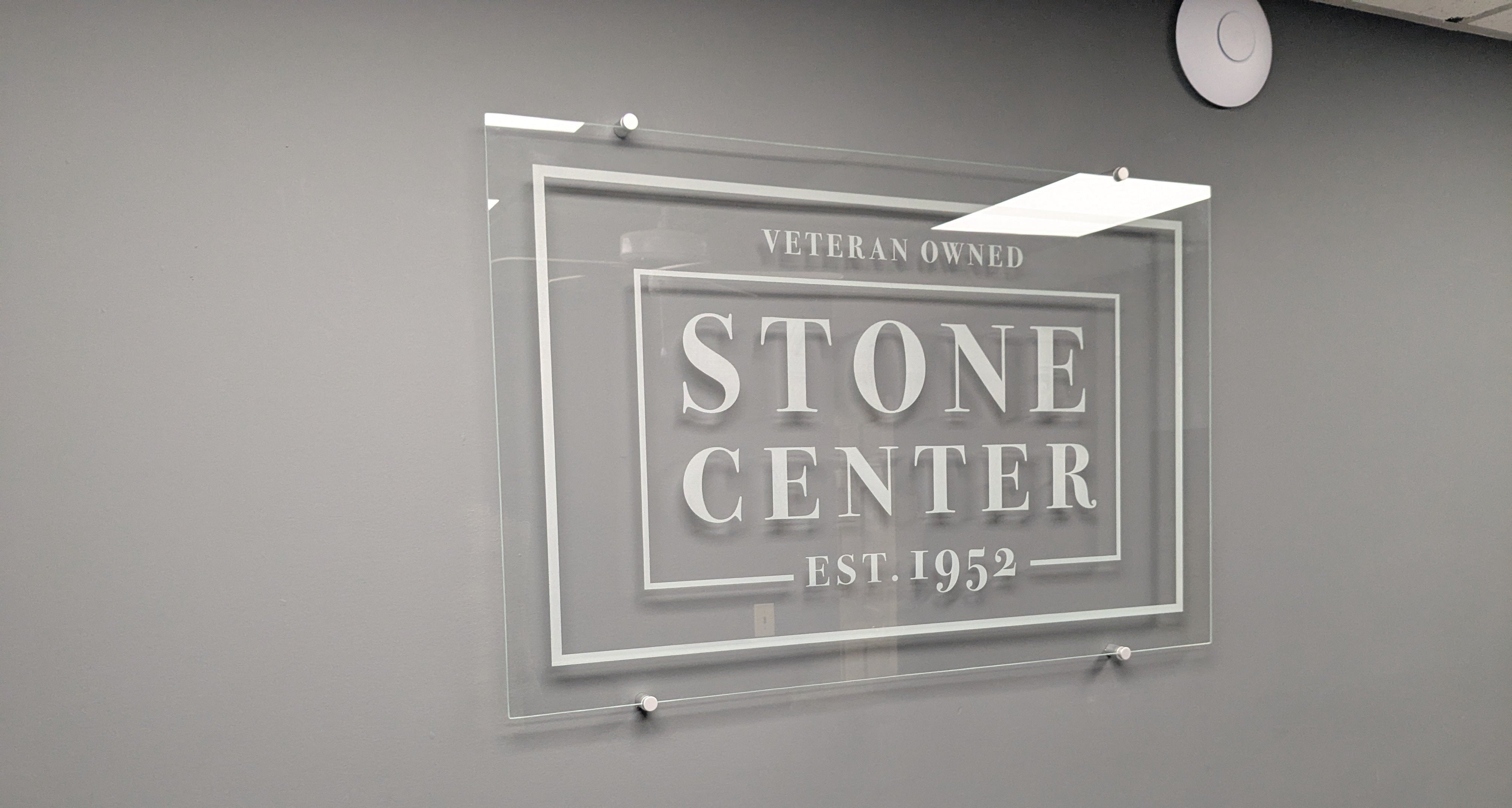 Stone Center Laser Etched Glass Stand Off Display Sign