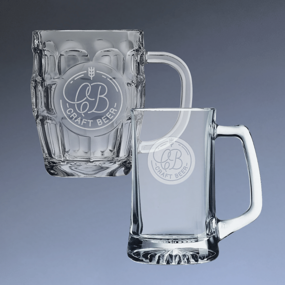 Two clear glass mugs with logo